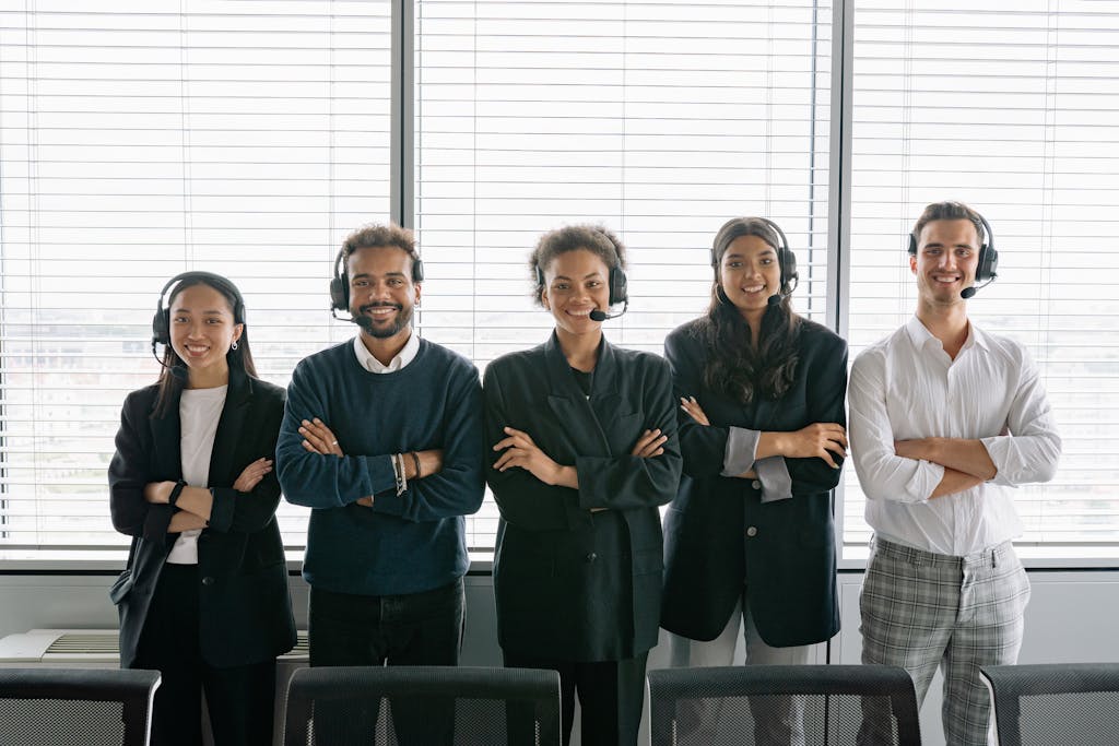 People Wearing Headset with Their Arms Crossed